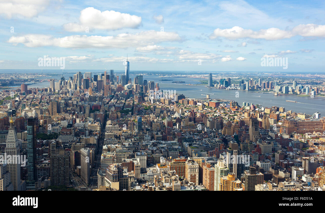 New York City, Cityscape view of Manhattan with skyscrapers and blue sky by day. Stock Photo