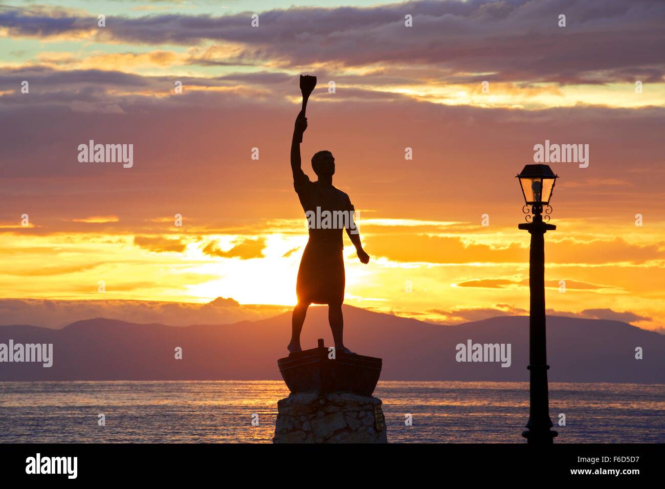 Statue of Giorgos Anemogiannis at The Harbour Entrance, Gaios Harbour, Paxos, The Ionian Islands, Greek Islands, Greece, Europe Stock Photo