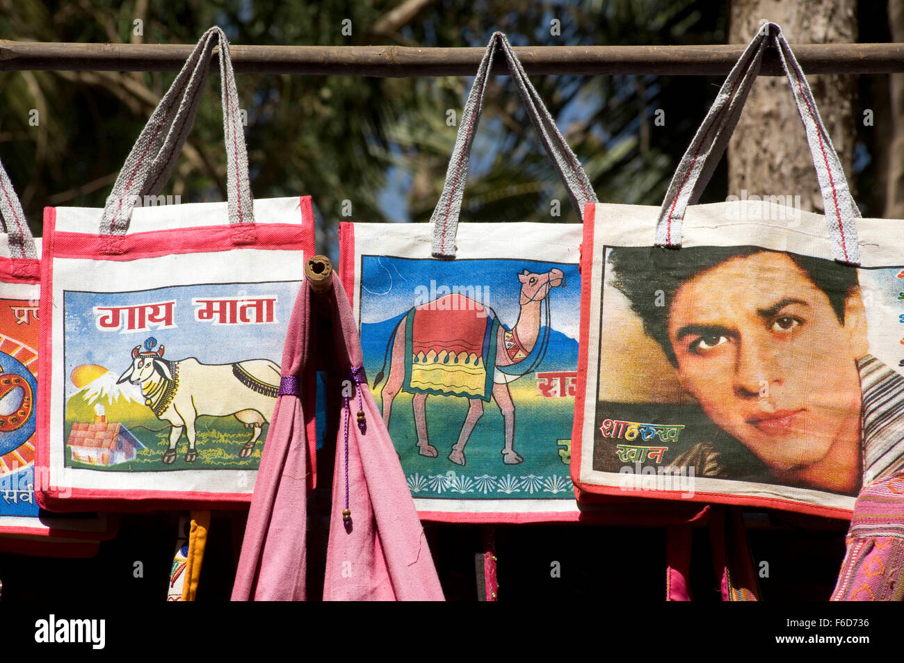 Painted cloth carry bags hanging on stall, palolem beach, goa, india, asia Stock Photo