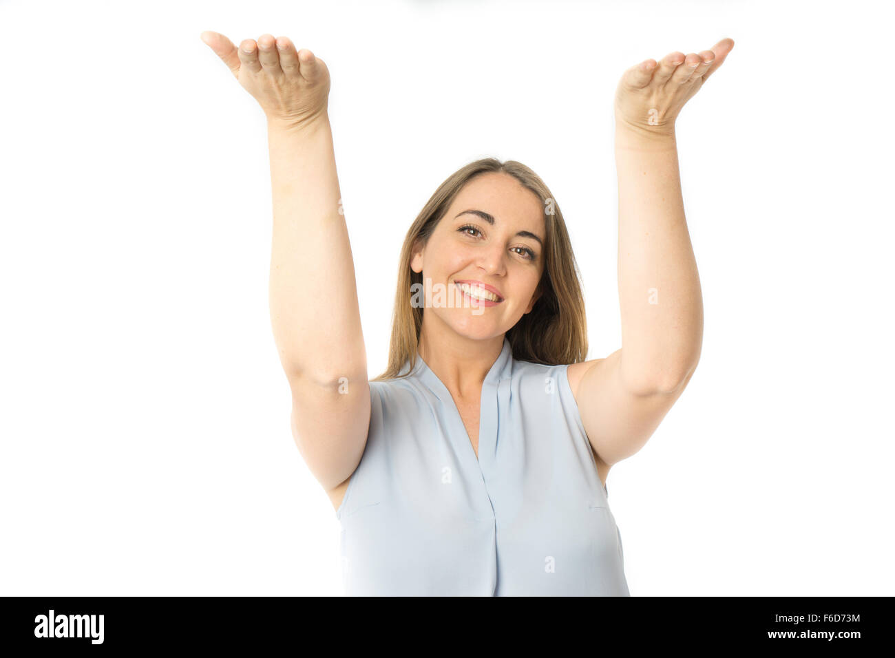 Woman with arms raised supporting something Stock Photo Alamy