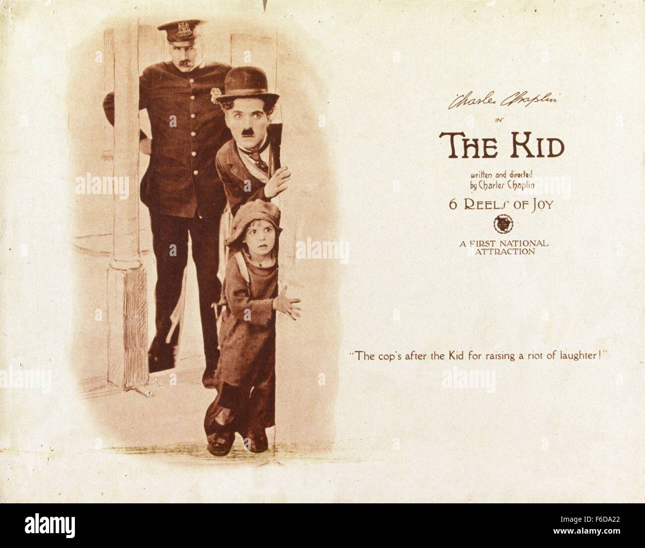 RELEASE DATE: February 6, 1921   MOVIE TITLE: The Kid   STUDIO: First National Pictures   PLOT: The Tramp cares for an abandoned child, but events put that relationship in jeopardy.   PICTURED: CHARLES CHAPLIN as A Tramp, JACKIE COOGAN as The Kid, and Tom Wilson. Stock Photo