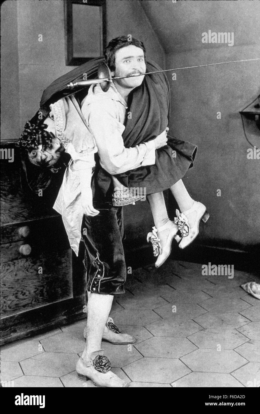 RELEASE DATE: August 28, 1921   MOVIE TITLE: The Three Musketeers   STUDIO: Douglas Fairbanks Pictures   PLOT: The young Gascon D'Artagnan arrives in Paris, his heart set on joining the king's Musketeers.   PICTURED: DOUGLAS FAIRBANKS. Stock Photo