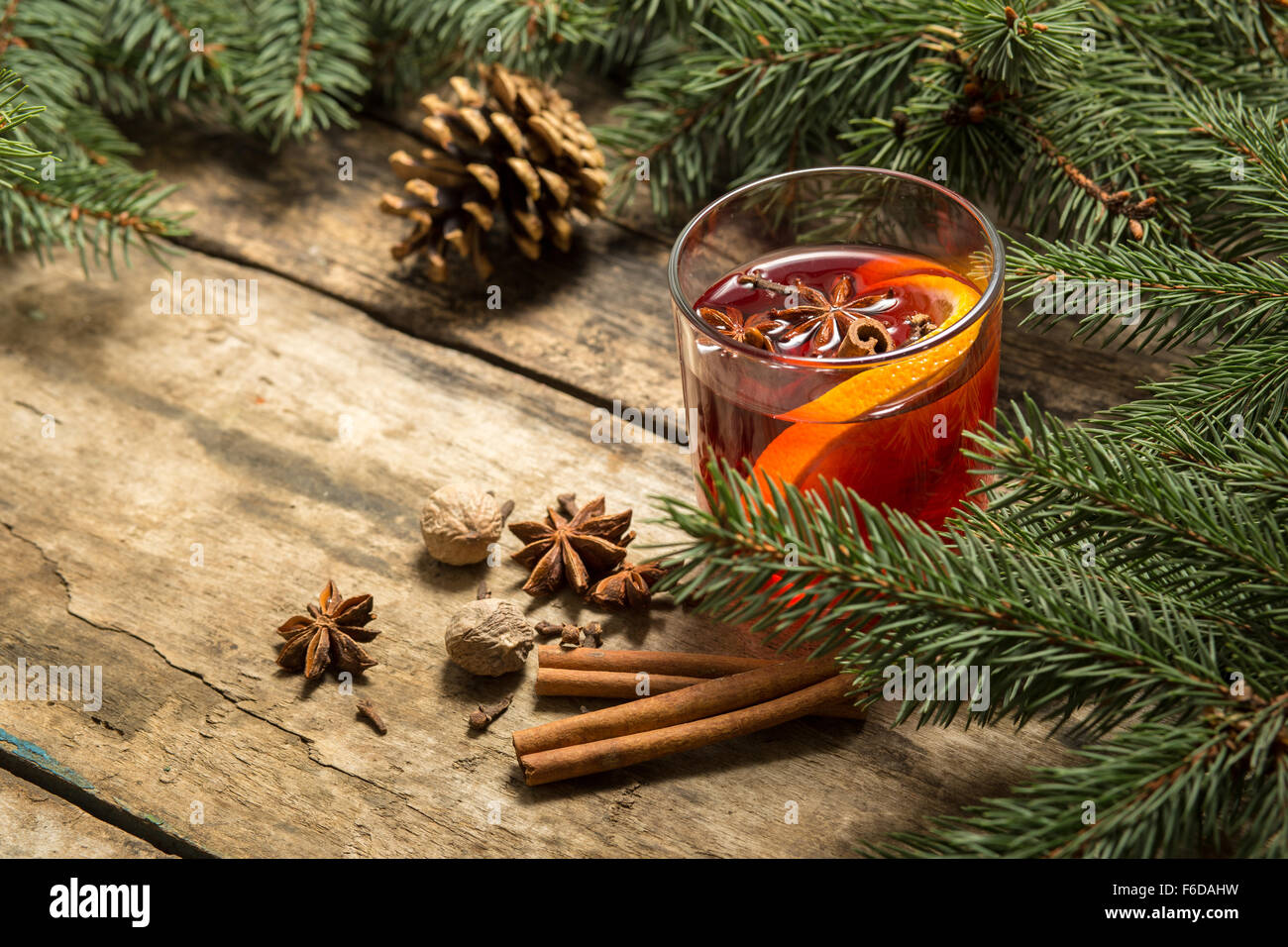 Christmas Alcoholic Drink On Wooden Background Glass Of Mulled Wine christmas-alcoholic-drink-on-wooden-background-glass-of-mulled-wine