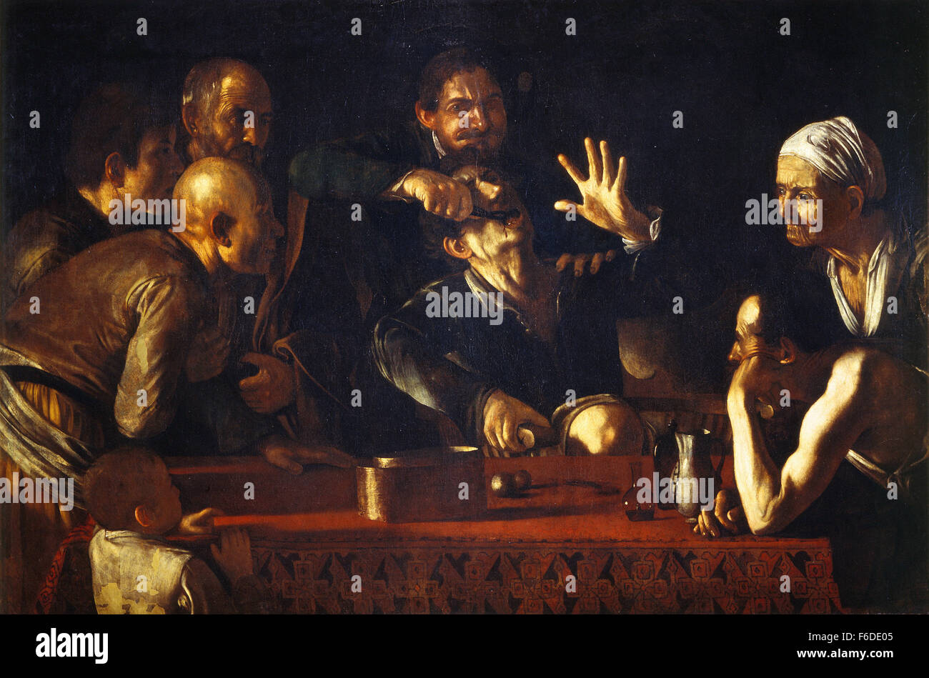 Michelangelo Merisi da Caravaggio - The Tooth Puller Stock Photo