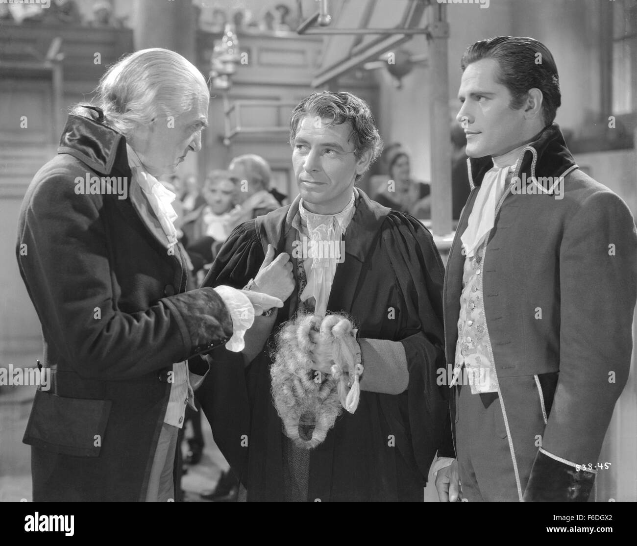 RELEASE DATE: December 25, 1935. MOVIE TITLE: A Tale of Two Cities. STUDIO: Metro-Goldwyn-Mayer (MGM). PLOT: An elaborate adaptation of Dickens' classic tale of the French Revolution. Dissipated lawyer Sydney Carton defends emigre Charles Darnay from charges of spying against England. He becomes enamored of Darnay's fiancZe, Lucie Manette, and agrees to help her save Darnay from the guillotine when he is captured by Revolutionaries in Paris. PICTURED: RONALD COLMAN as Sydney Carton. Stock Photo