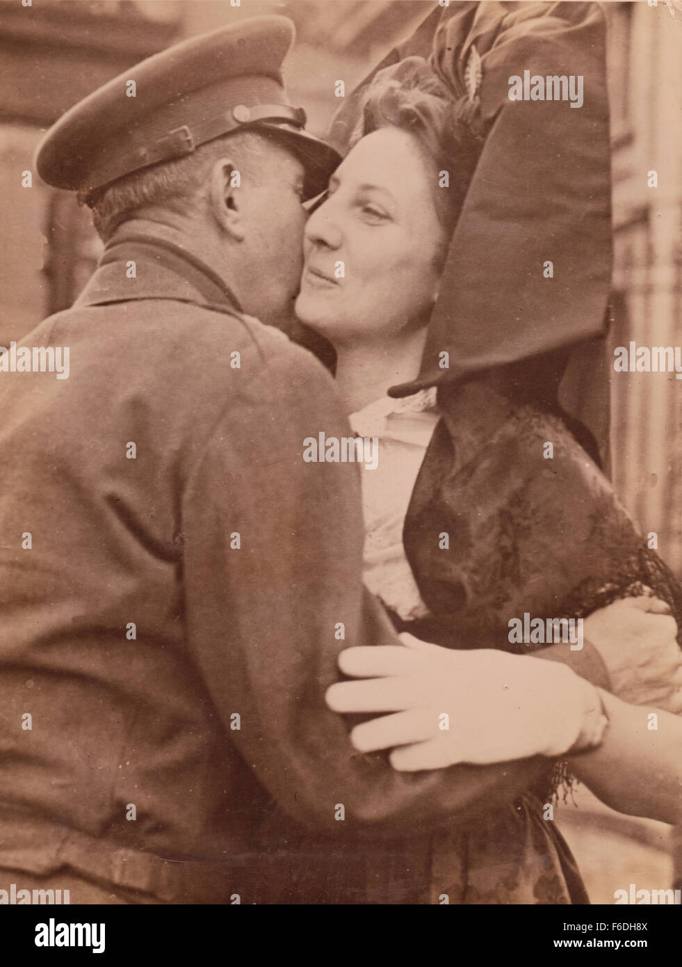 702. Lieutenant General Jacob l. Devers. Sixth US Army Group kisses a French Alsatian woman The Liberation Ceremony of Belfort. Stock Photo