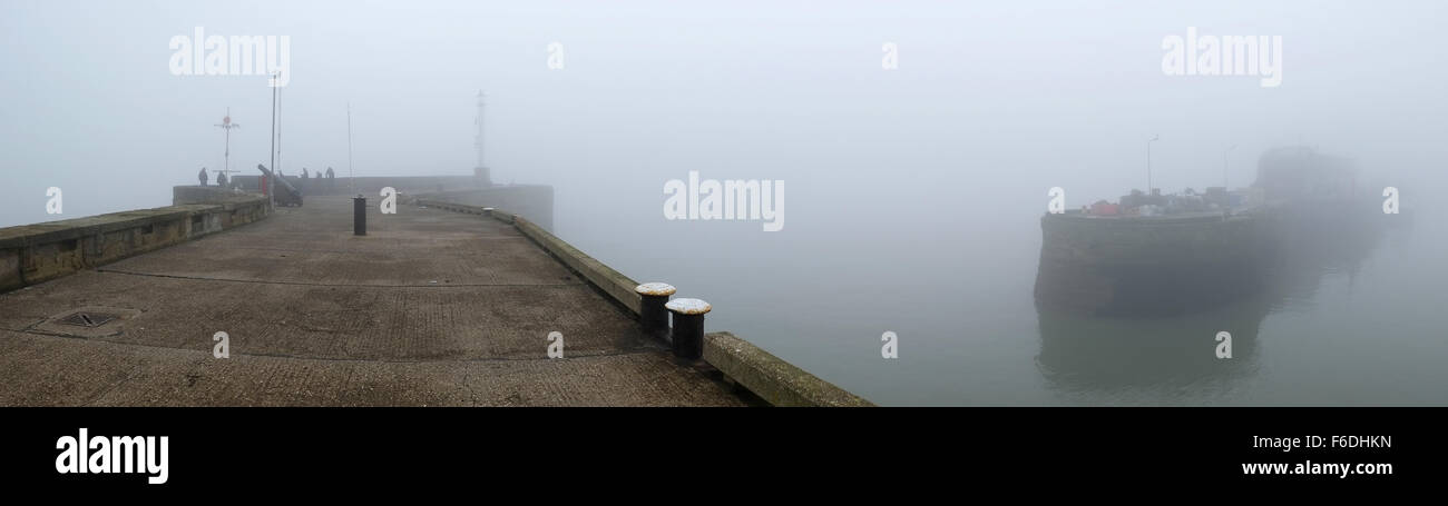 Panoramic view of piers in sea mist. Stock Photo