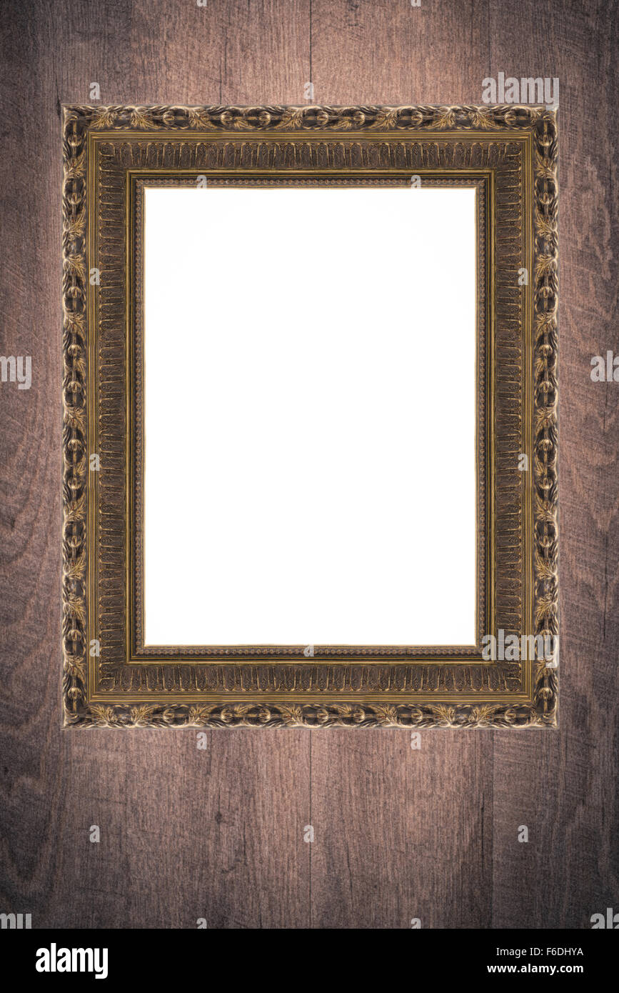 Old picture frame on vintage wood wall Stock Photo - Alamy