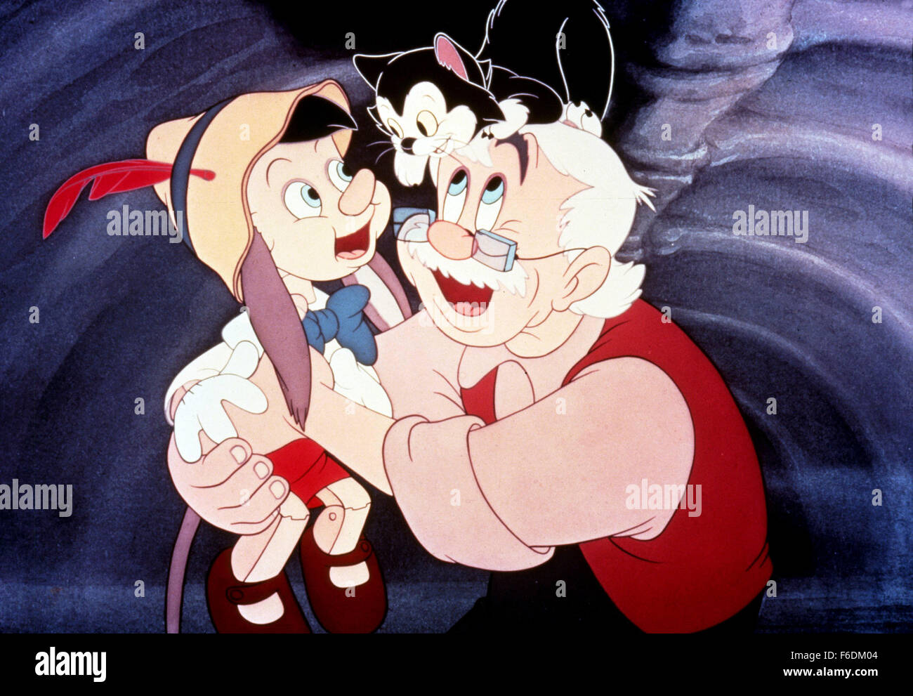 Feb 07, 1940; Hollywood, CA, USA; DICKIE JONES (left) as voice of Pinocchio and CHRISTIAN RUB as the voice of Geppetto with Figaro in the family, animated, fantasy ''Pinocchio'' directed by Hamilton Luske and Ben Sharpsteen. Stock Photo