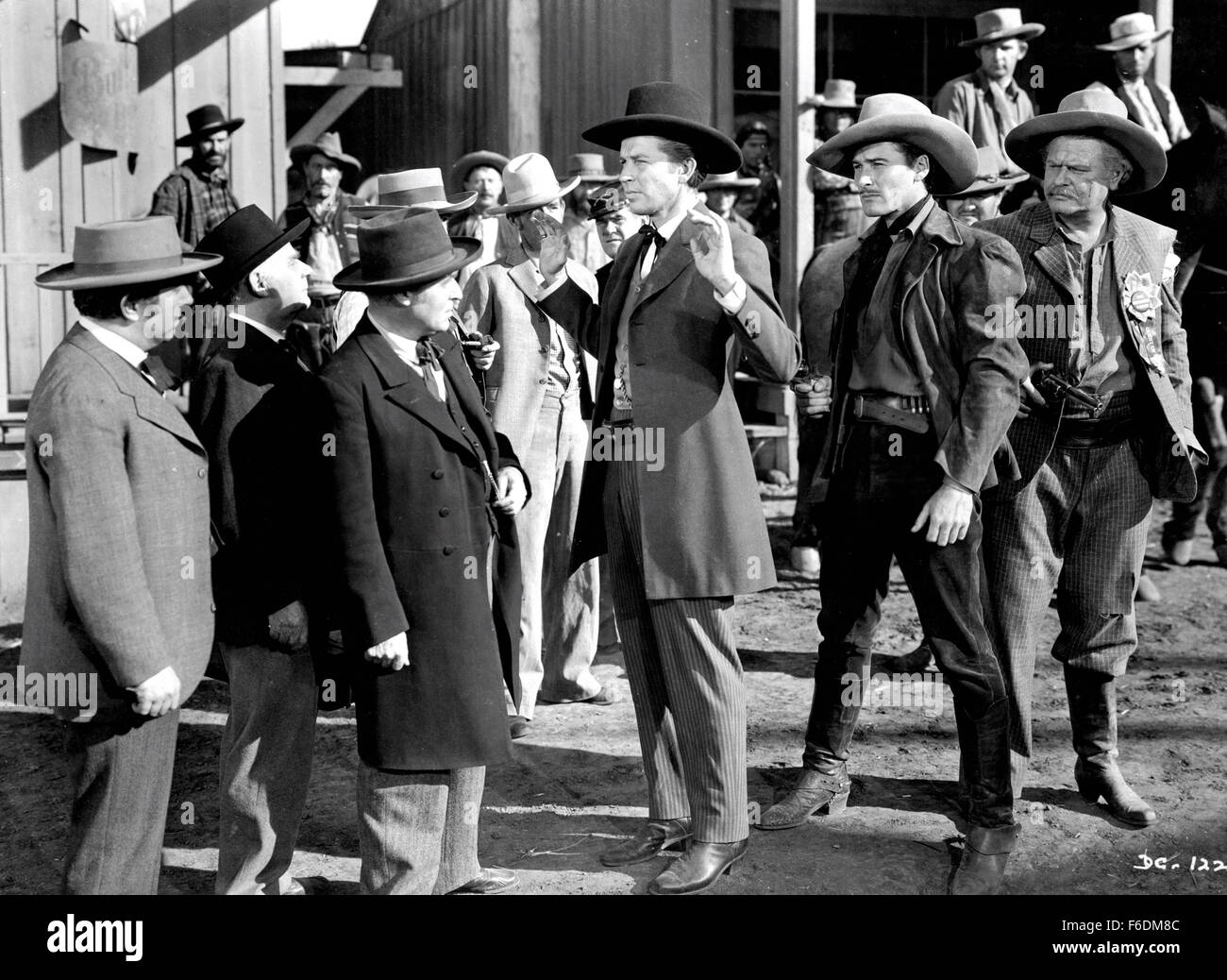 RELEASE DATE: April 8, 1939. MOVIE TITLE: Dodge City. STUDIO: Warner Bros. Pictures. PLOT: Dodge City. A wide-open cattle town run by Jeff Surrett. Even going on a children's Sunday outing is not a safe thing to do. What the place needs is a fearless honest Marshal. A guy like Wade Hatton, who helped bring the railroad in. It may not help that he fancies Abbie Irving, who won't have anything to do with him since he had to shoot her brother. But that's the West. PICTURED: ERROL FLYNN as Wade Hatton. Stock Photo