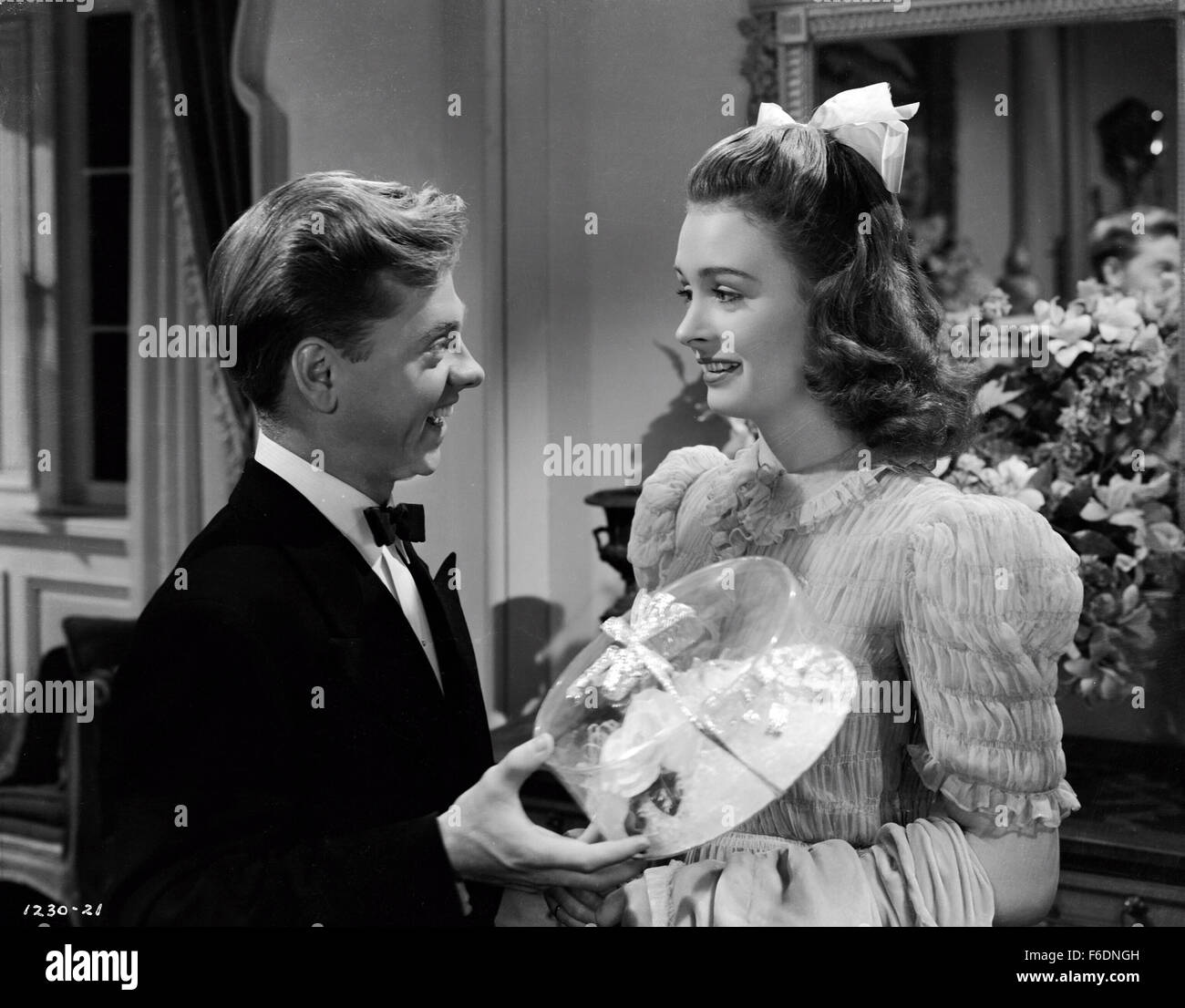 Mar 03, 1942 - Original Film Title: The Courtship of Andy Hardy. PICTURED: MICKEY ROONEY, DONNA REED. Stock Photo