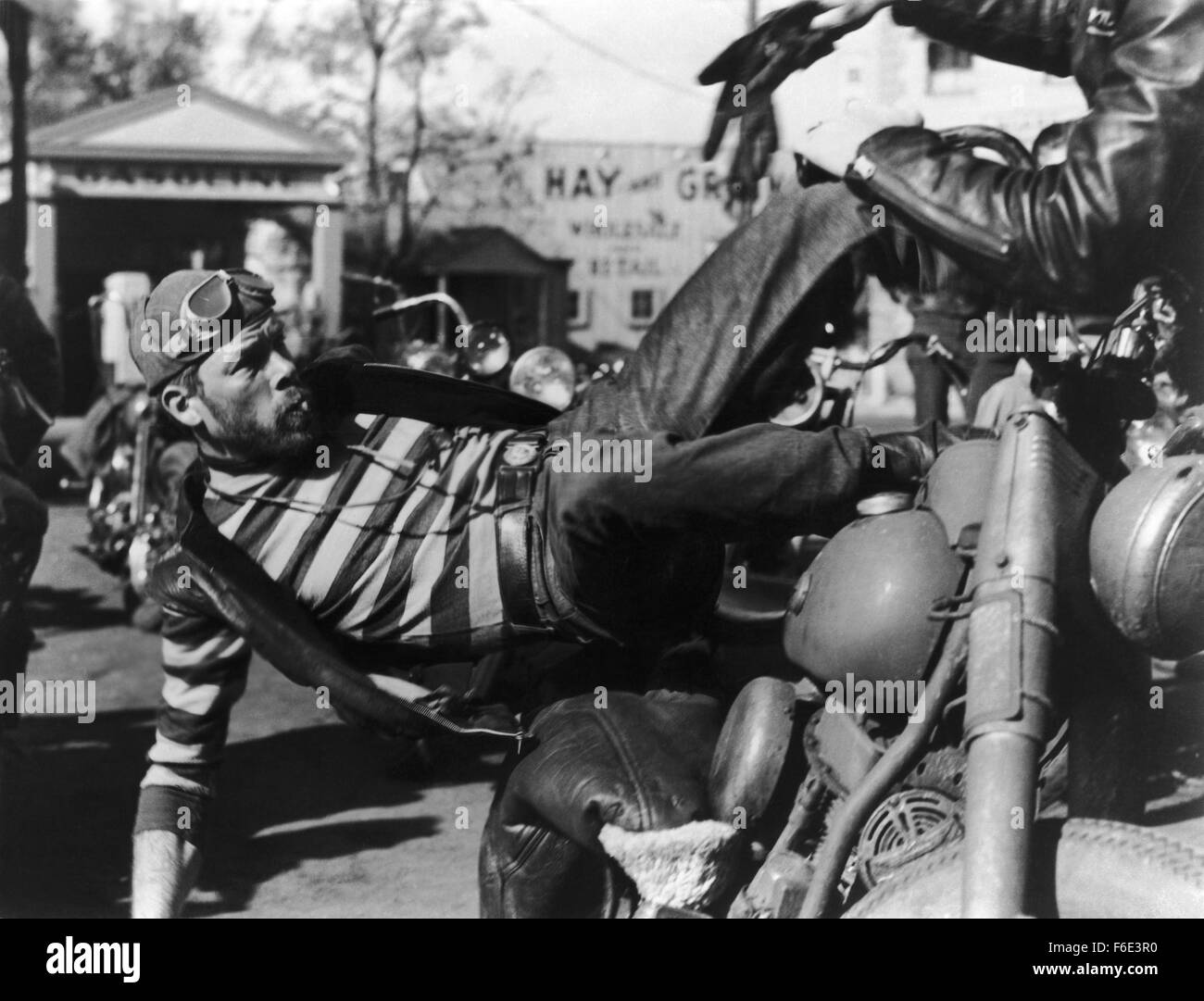 RELEASE DATE: December 30, 1953. MOVIE TITLE: The Wild One. STUDIO: Stanley Kramer Productions. PLOT: A gang of forty motorcyclists, the Black Rebels Motorcycle Club, gate-crash a legitimate motorcycle race. They are eventually thrown out, but one of the gang steals the second prize trophy and gives it to their leader, Johnny. The gang then ride into Wrightsville, where they race up and down the main street before piling into Bleekers - the local bar. The owner of the bar is happy to let the bikers spend their money, so does not support the sheriff's attempt to address any disturbances. Stuck Stock Photo