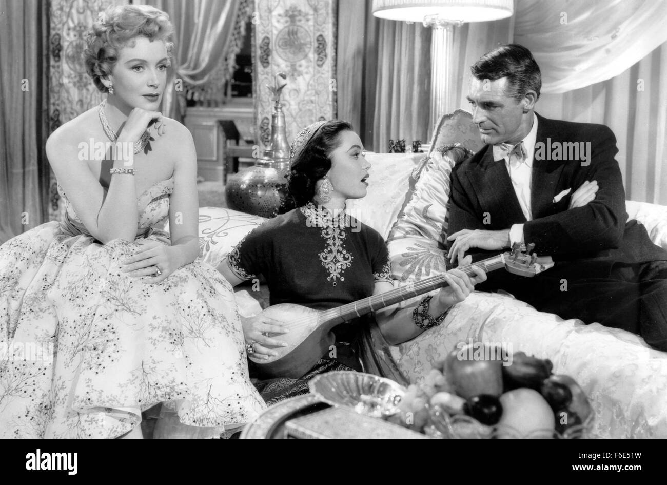 Jun 19, 1953; Hollywood, CA, USA; (L-R): Actress DEBORAH KERR as Priscilla 'Effie' Effington, BETTA ST. JOHN as Princess Tarji and CARY GRANT as Clemson Read in the MGM romantic comedy, 'Dream Wife.' Stock Photo
