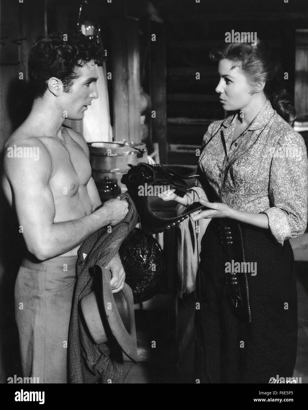 RELEASE DATE: July 19, 1957. MOVIE TITLE: Gun Glory. STUDIO: Metro-Goldwyn-Mayer (MGM). PLOT: . PICTURED: RHONDA FLEMING as Jo. Stock Photo