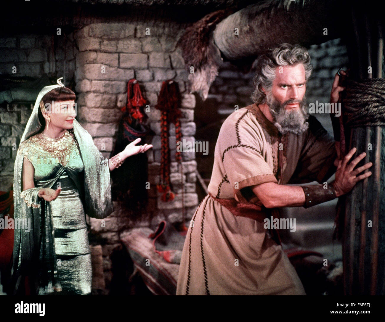 RELEASED DATE: Oct 05, 1956. MOVIE TITLE: The Ten Commandments. STUDIO: Paramount Pictures. PLOT: Moses leads the slaves from the tyranny of the Egyptian pharaoh and into the desert where he is later given the law of God. Once the pharaoh's chief architect, Moses receives the attentions of the Queen until he rebels and is cast into exile. PICTURED: CHARLTON HESTON and ANNE BAXTER star as Moses and Nefretiri. Stock Photo