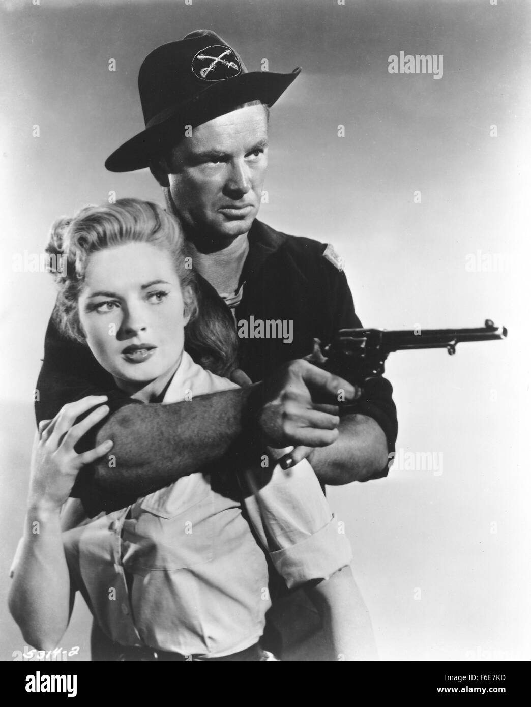 RELEASE DATE: April 25, 1954. MOVIE TITLE: Arrow in the Dust. STUDIO: Allied Artists Pictures. PLOT: . PICTURED: STERLING HAYDEN as Bart Lash and COLEEN GRAY as Christella Burke. Stock Photo