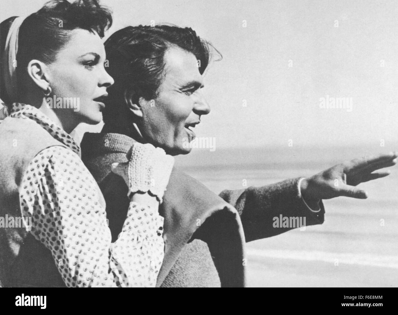 RELEASE DATE: October 16, 1954. MOVIE TITLE: A Star is Born. STUDIO: Warner Bros. Pictures. PLOT: Norman Maine, a movie star whose career is on the wane, meets showgirl Esther Blodgett when he drunkenly stumbles into her act one night. A friendship develops, then blossoms into romance before tensions increase as Esther's career takes off while Norman's continues to plummet. PICTURED: JUDY GARLAND as Vicki Lester/Esther Blodgett and JAMES MASON as Norman Maine. Stock Photo