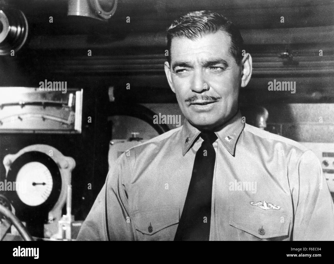 RELEASE DATE: March 27, 1958. MOVIE TITLE: Run Silent Run Deep. STUDIO: Jeffrey Pictures Corp. PLOT: The captain of a submarine sunk by the Japanese during WWII is finally given a chance to skipper another sub after a year of working a desk job. His singleminded determination for revenge against the destroyer that sunk his previous vessel puts his new crew in unneccessary danger. PICTURED: CLARK GABLE as Cmdr. Richardson. Stock Photo