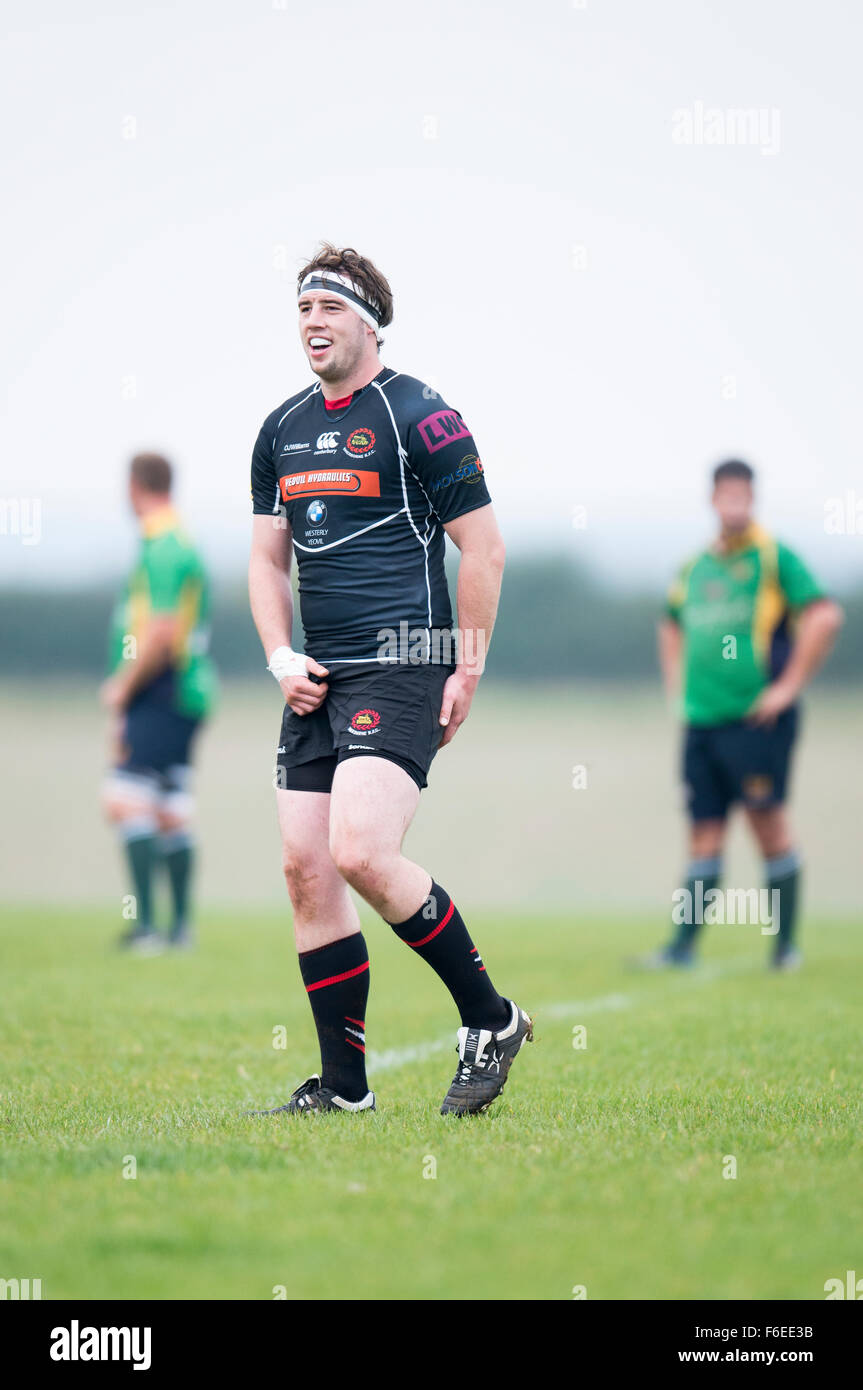 Rugby player scratching shorts Stock Photo