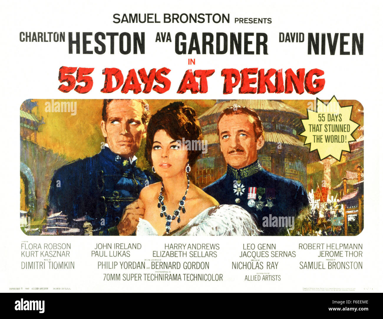 RELEASED DATE: May 29, 1963. MOVIE TITLE: 55 Days at Peking. STUDIO: Samuel Bronston Productions. PLOT: Diplomats, soldiers and other representatives of a dozen nations fend off the siege of the International Compound in Peking during the 1900 Boxer Rebellion. The disparate interests unite for survival despite competing factions, overwhelming odds, delayed relief and tacit support of the Boxers by the Empress of China and her generals. PICTURED: CHARLTON HESTON as Maj. Matt Lewis, AVA GARDNER as Baroness Natalie Ivanoff and DAVID NIVEN as Sir Arthur Robertson; Movie Card. Stock Photo