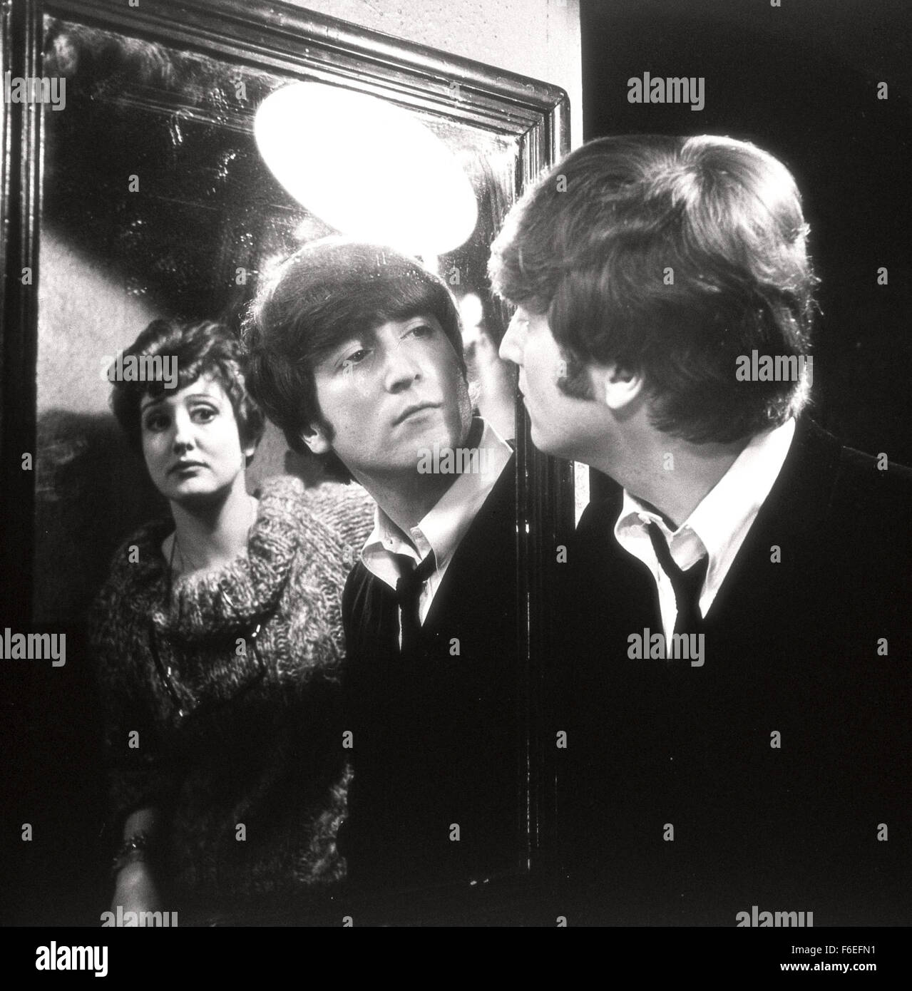 Jul 12, 1964; London, UK; Musician JOHN LENNON as John in 'A Hard Day's Night'. Directed by Richard Lester. Stock Photo