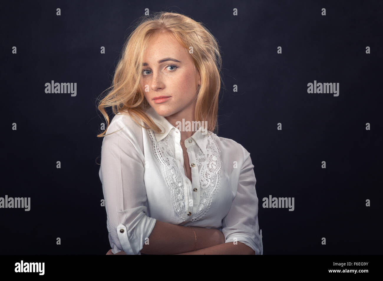 attractive young woman portrait on black background Stock Photo - Alamy