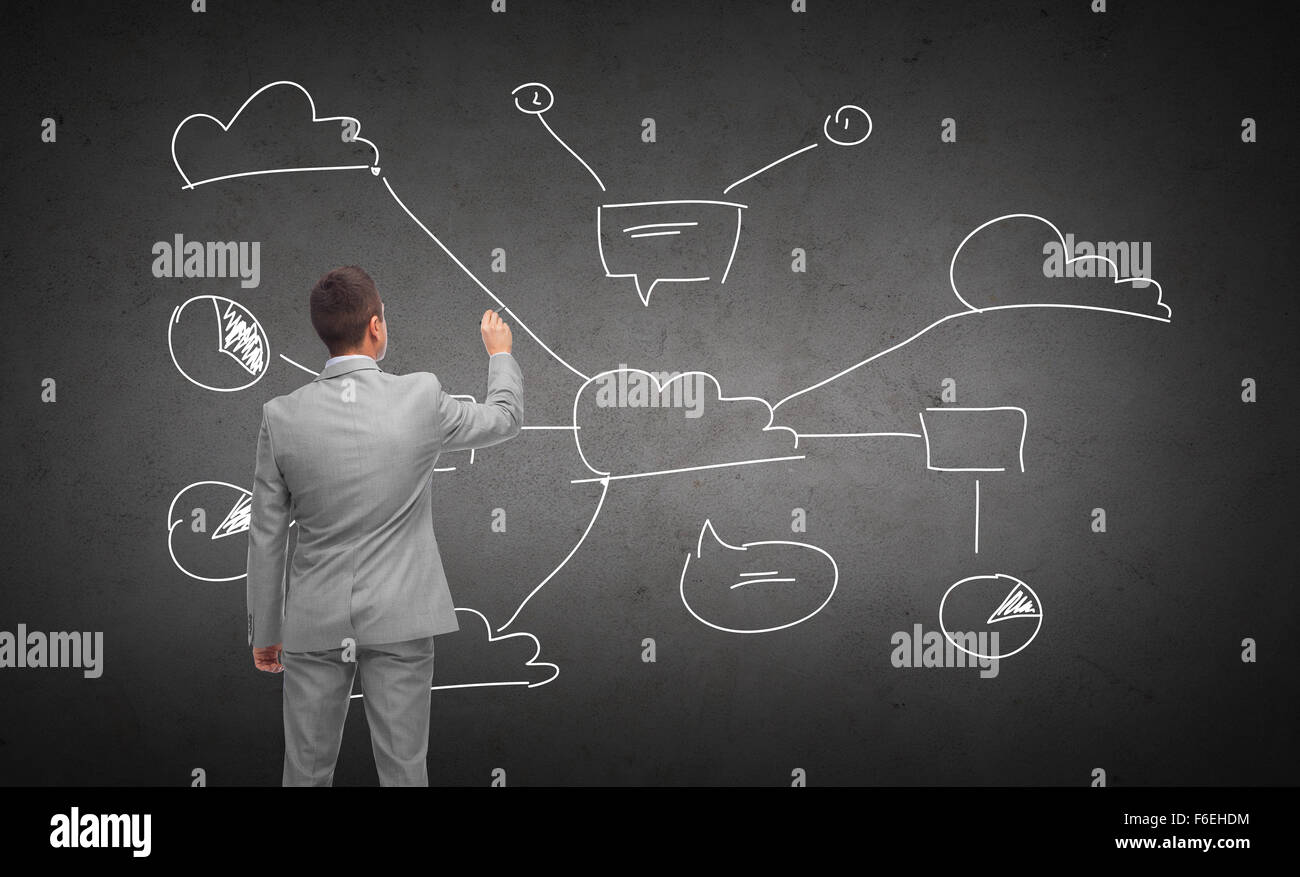 businessman drawing cloud computing scheme Stock Photo