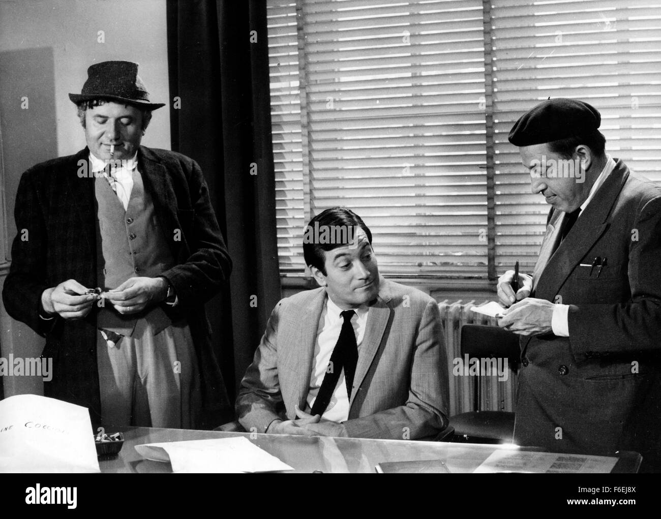 July 2, 1966 - Paris, France - Scene of the latest film of Guy Lefranc with JEAN RICHARD (L), with GERARD BARRAY (C) and PAUL PREBOIST (R) which is named 'Dirty weather for flies.' PICTURED: The three co-stars in a scene from the film. (Credit Image: c KEYSTONE Pictures USA) Stock Photo