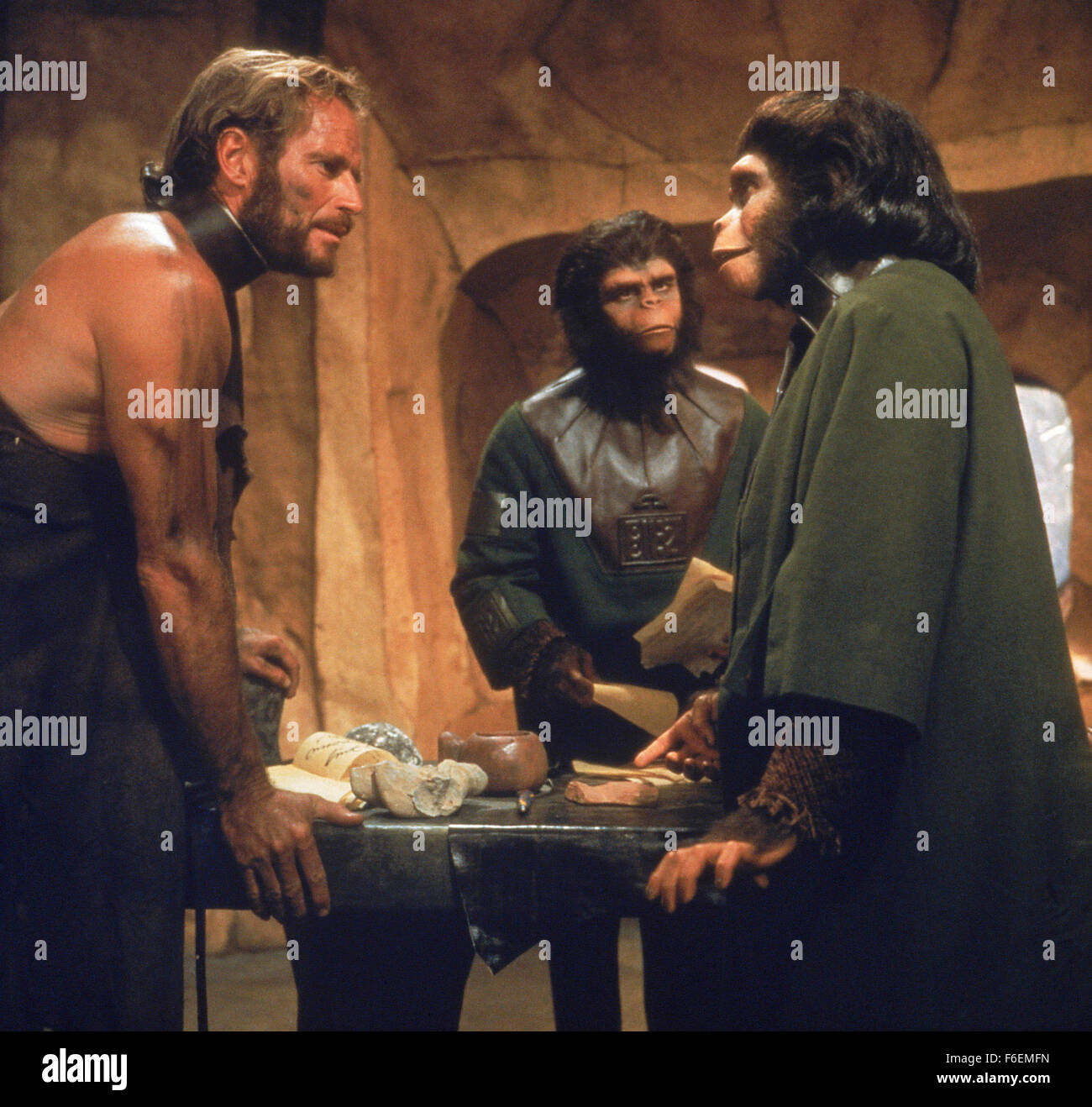 RELEASED DATE: Feb 08, 1968. MOVIE TITLE: Planet of the Apes. STUDIO: 20th Century Fox. PLOT: Taylor and two other astronauts come out of deep hibernation to find that their ship has crashed. Escaping with little more than clothes they find that they have landed on a planet where men are pre-lingual and uncivilized while apes have learned speech and technology. Taylor is captured and taken to the city of the apes after damaging his throat so that he is silent and cannot communicate with the apes. PICTURED: CHARLTON HESTON as George Taylor and KIM HUNTER as Zira. Stock Photo
