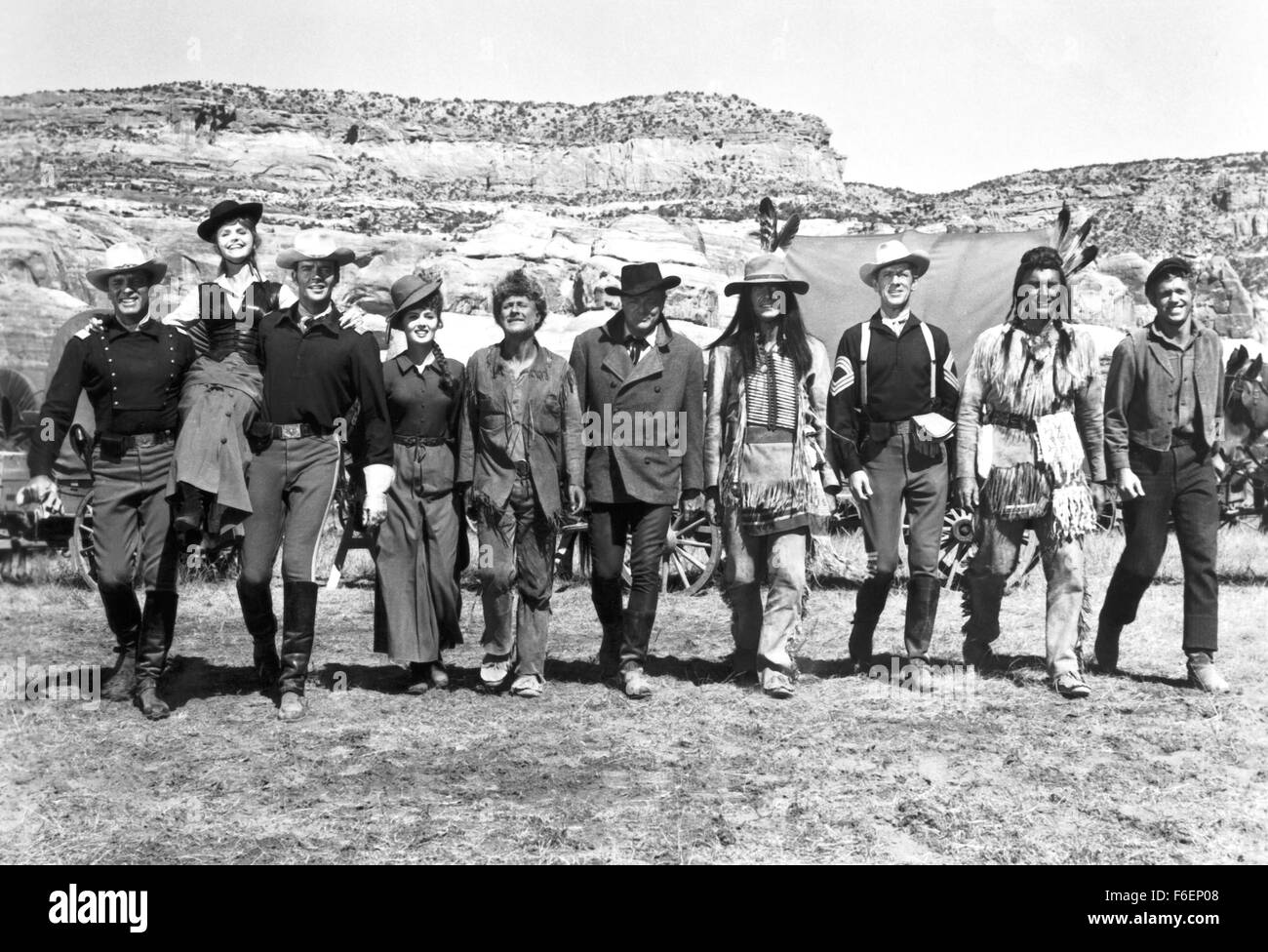 RELEASE DATE: June 23rd, 1965. MOVIE TITLE: The Hallelujah Trail. STUDIO: MGM. PLOT: A wagon train heads for Denver with a cargo of whisky for the miners. Chaos ensues as the Temperance League, the US cavalry, the miners and the local Indians all try to take control of the valuable cargo. PICTURED: Movie's cast. Stock Photo