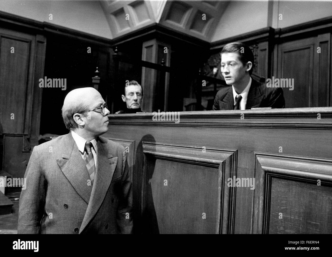 June 16, 1970 - London, England, U.K. - An exact replica of the No. 1 Courtroom at London's Central Criminal Court (The Old Bailey) has been built at Shepperton Studios for a film reconstruction of a trial that made English legal history. It was built for the film '10 Rillington Place', all about notorious English mass-murderer John Regibald Christie, who in 1950, framed another man, Timothy John Evans for crimes committed by Christie himself. The picture shows actors RICHARD ATTENBOROUGH and JOHN HURT in a scene of the today's filming at Shepperton. (Credit Image: c KEYSTONE Pictures USA/ Stock Photo