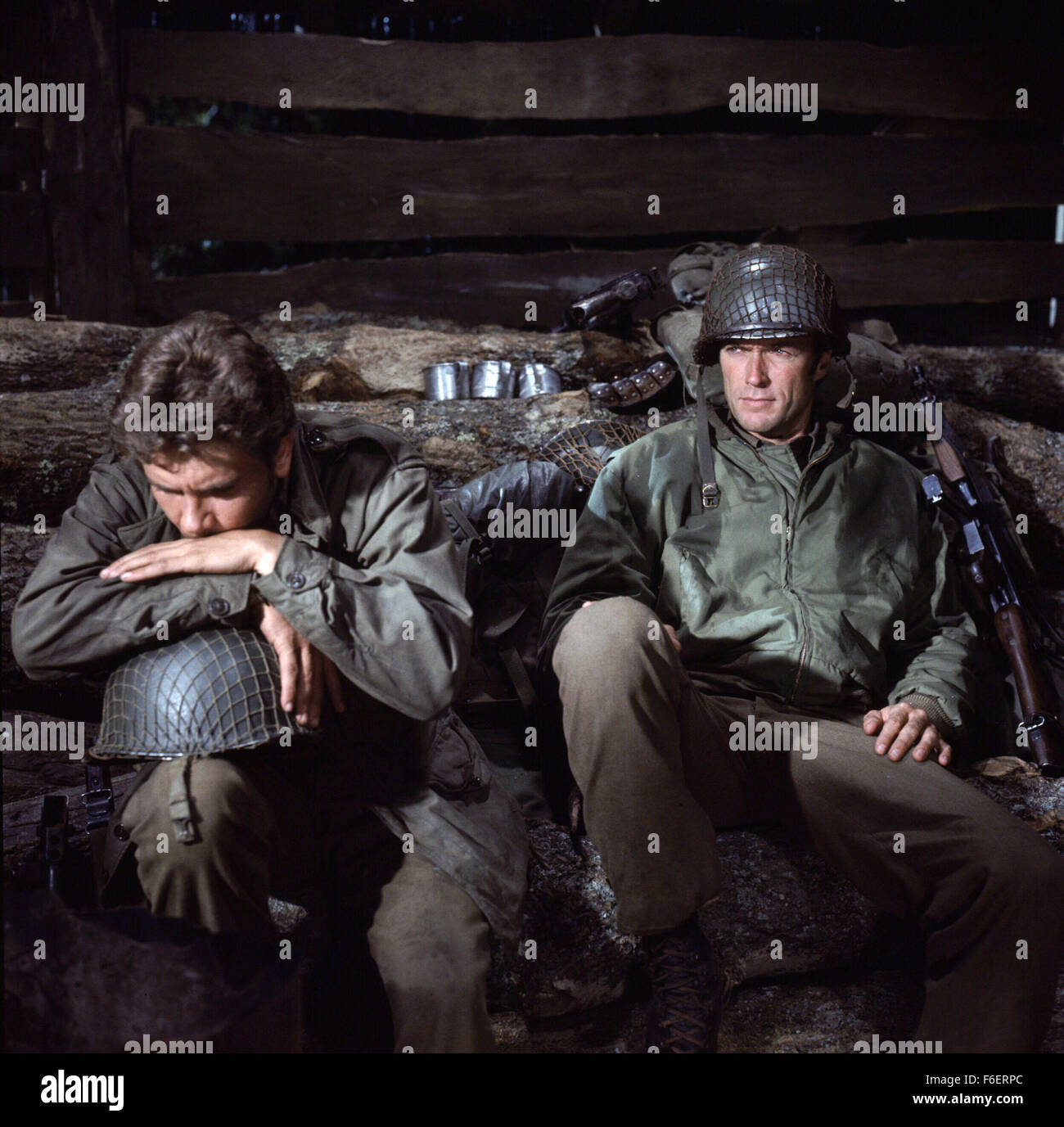 Jun 23, 1970; Hollywood, CA, USA; CLINT EASTWOOD (right) as Pvt. Kelly in the action, war, comedy ''Kelly's Heroes'' directed by Brian G. Hutton. Stock Photo