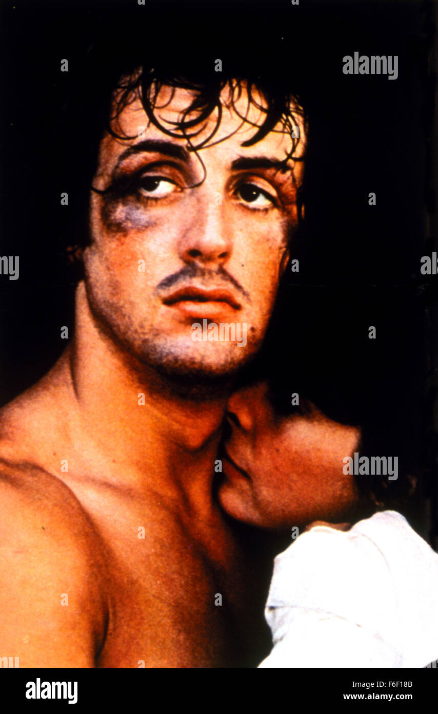 Film Title:  ROCKY.  DIRECTOR John G. Avildsen.  STUDIO:  United Artists.  PLOT:  The action-packed, crowd-pleasing story, shot mostly on location, tells of the rise of a small-time, underdog Philadelphia boxer, Rocky Balboa (Sylvester Stallone) against insurmountable odds in a big-time bout with Apollo Creed (Carl Weathers), with the emotional support of a shy,  loving girlfriend named Adrian (Talia Shire), and wily fight manager Mickey (Burgess Meredith). PICTURED:  SYLVESTER STALLONE, TALIA SHIRE. Stock Photo