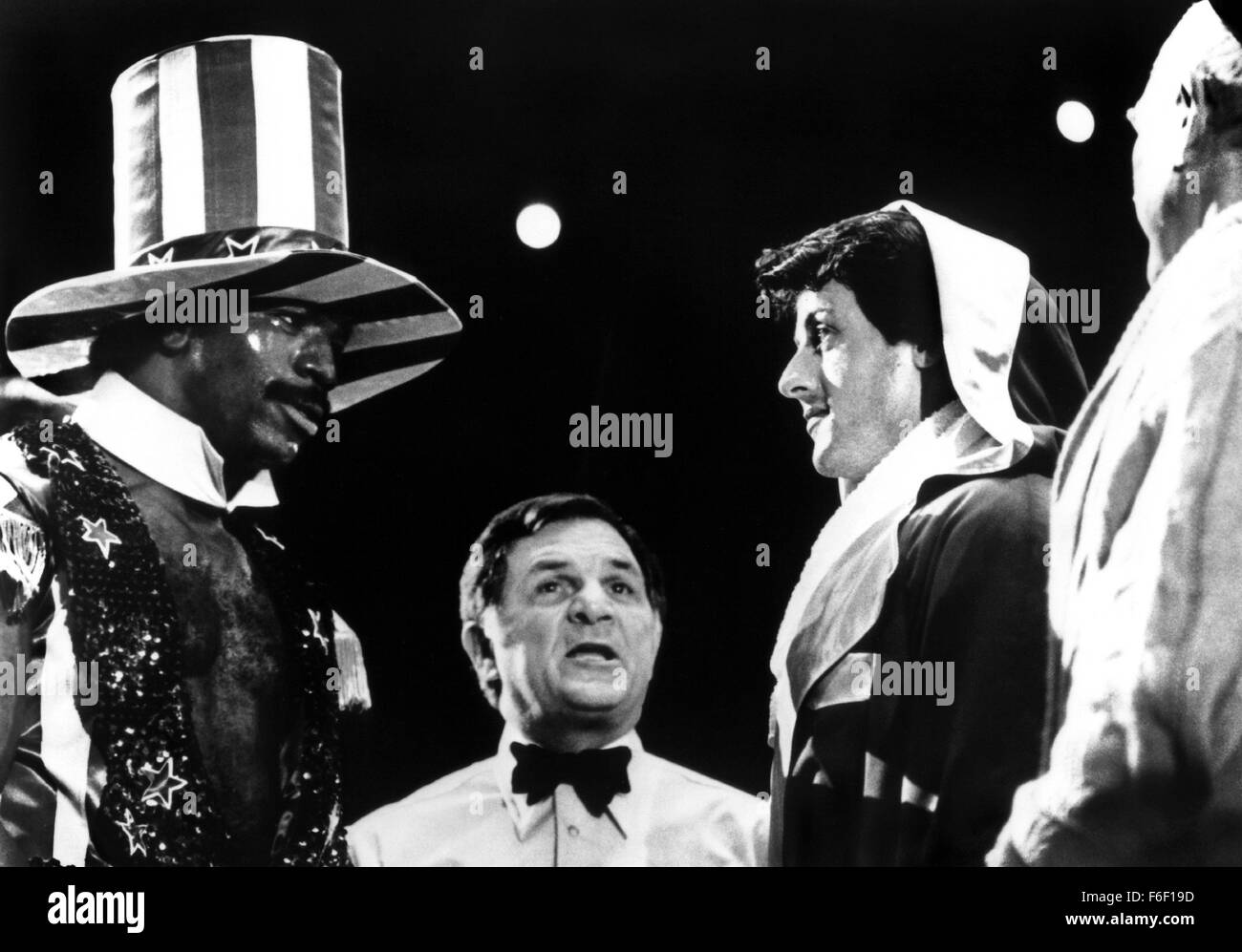 Film Title:  ROCKY.  DIRECTOR John G. Avildsen.  STUDIO:  United Artists.  PLOT:  The action-packed, crowd-pleasing story, shot mostly on location, tells of the rise of a small-time, underdog Philadelphia boxer, Rocky Balboa (Sylvester Stallone) against insurmountable odds in a big-time bout with Apollo Creed (Carl Weathers), with the emotional support of a shy,  loving girlfriend named Adrian (Talia Shire), and wily fight manager Mickey (Burgess Meredith). PICTURED:  CARL WEATHERS, SYLVESTER STALLONE. Stock Photo