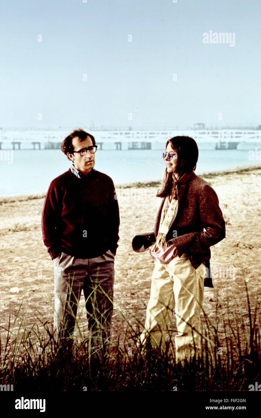 Film Title:  ANNIE HALL.  DIRECTOR:  Woody Allen.  STUDIO: UNITED ARTISTS  PLOT:    After breaking up with his girlfriend Annie Hall (Diane Keaton), neurotic comedian Alvy Singer (Woody Allen) goes on a stream of conciousness journey through his memories of their relationship, trying to find out what caused them to part ways. The film features innovative elements including cartoon segments, flashbacks, and even breaking the 'fourth wall' by having characters address the camera.  The  film marks the fourth pairing of Keaton and Allen, who were also an off-screen couple at the time.  Winner of 4 Stock Photo