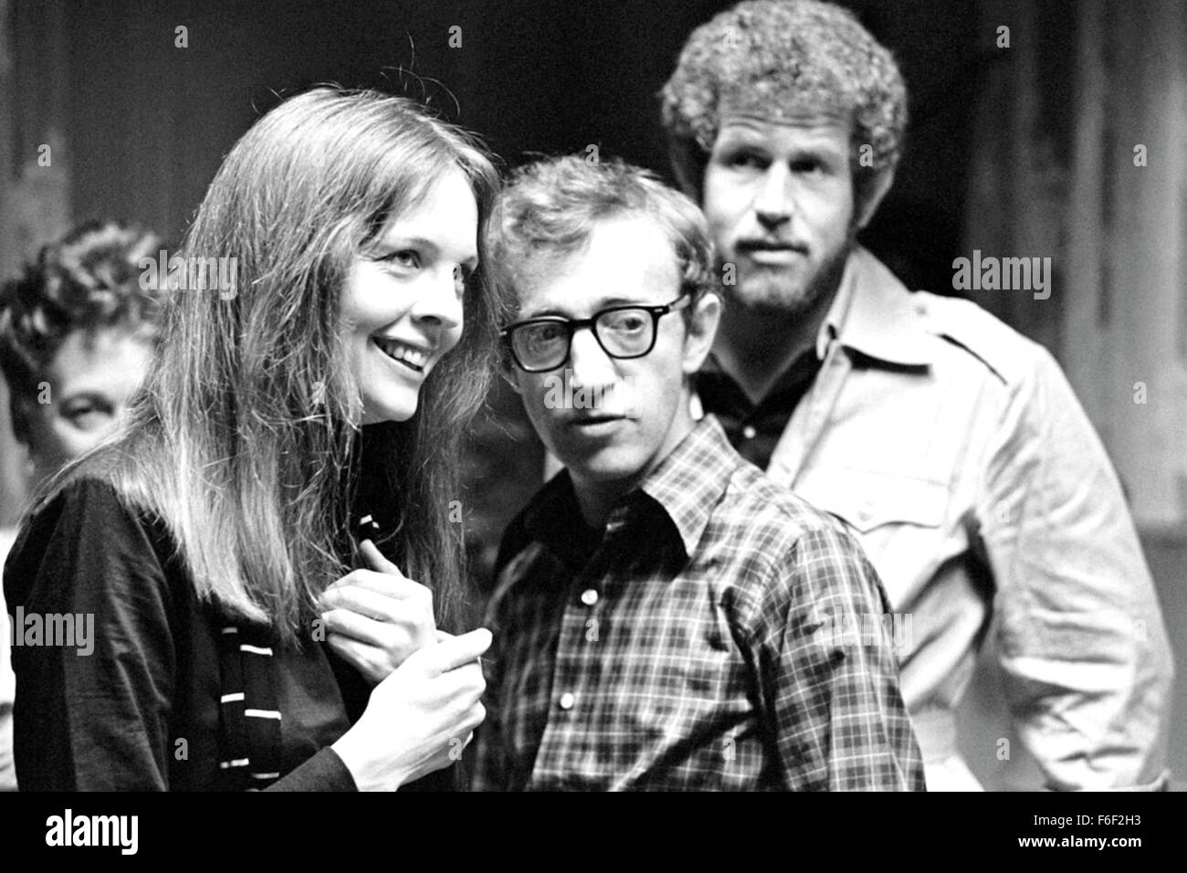 RELEASE DATE: April 20,1977 TITLE: Annie Hall. STUDIO: United Artists PLOT: After breaking up with his girlfriend Annie Hall (Diane Keaton), neurotic comedian Alvy Singer (Woody Allen) goes on a stream of conciousness journey through his memories of their relationship, trying to find out what caused them to part ways. The film features innovative elements including cartoon segments, flashbacks, and even breaking the 'fourth wall' by having characters address the camera. PICTURED: WOODY ALLEN, TONY ROBERTS, DIANE KEATON on set. Stock Photo