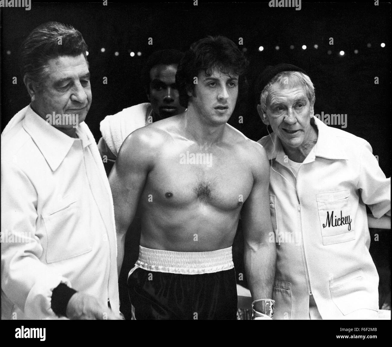 Jun 15, 1979; Philadelphia, PA, USA; SYLVESTER STALLONE (center) as Rocky Balboa and BURGESS MEREDITH (right) as Mickey Goldmill in the action, sport, drama 'Rocky II' directed by Sylvester Stallone. Stock Photo
