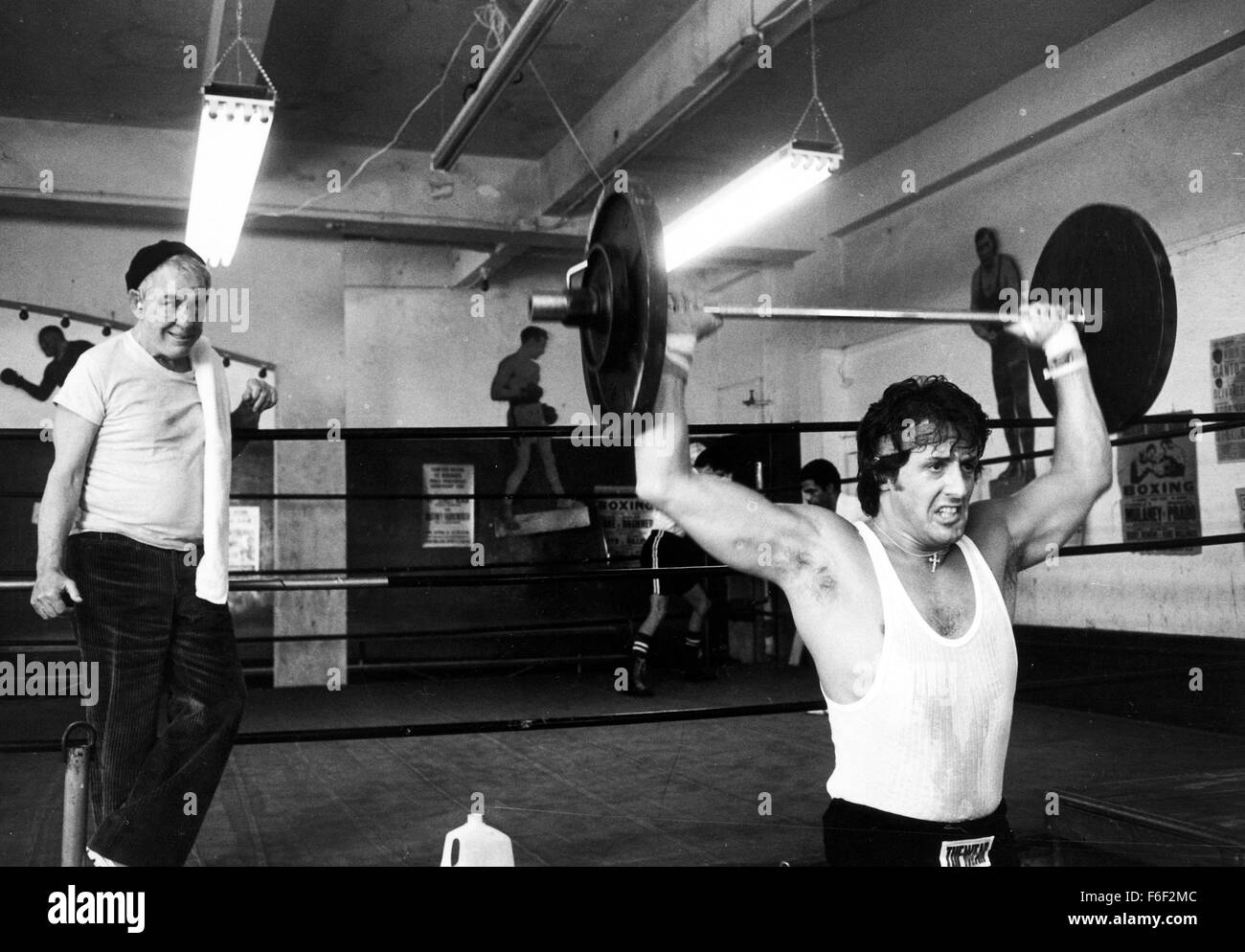 Jun 15, 1979; Philadelphia, PA, USA; SYLVESTER STALLONE (front) as Rocky Balboa and BURGESS MEREDITH as Mickey Goldmill in the action, sport, drama 'Rocky II' directed by Sylvester Stallone. Stock Photo