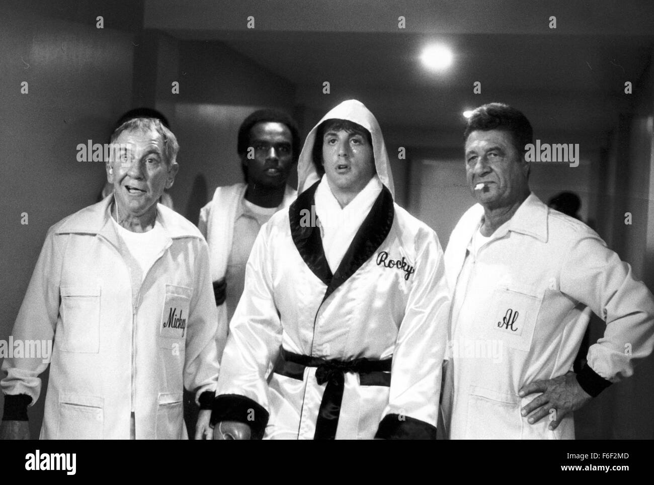 Jun 15, 1979; Philadelphia, PA, USA; BURGESS MEREDITH (left) as Mickey Goldmill and SYLVESTER STALLONE (third in from left) as Rocky Balboa in the action, sport, drama 'Rocky II' directed by Sylvester Stallone. Stock Photo