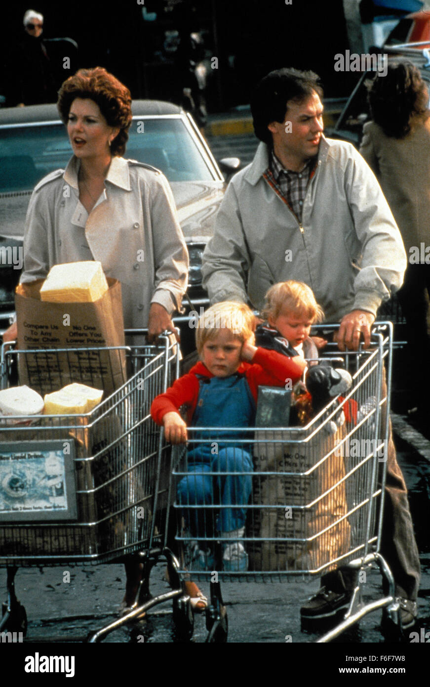RELEASE DATE: July 22, 1983  MOVIE TITLE: Mr. Mom  DIRECTOR: Stan Dragoti  STUDIO: Sherwood Productions  PLOT: Jack and Caroline are a couple making a decent living when Jack suddenly loses his job. They agree that he should stay at home and look after the house while Caroline works. It's just that he's never done it before, and really doesn't have a clue  PICTURED: ANN JILLIAN as Joan and MICHAEL KEATON as Jack Butler   (Credit Image: c Sherwood ProductionsEntertainment Pictures) Stock Photo