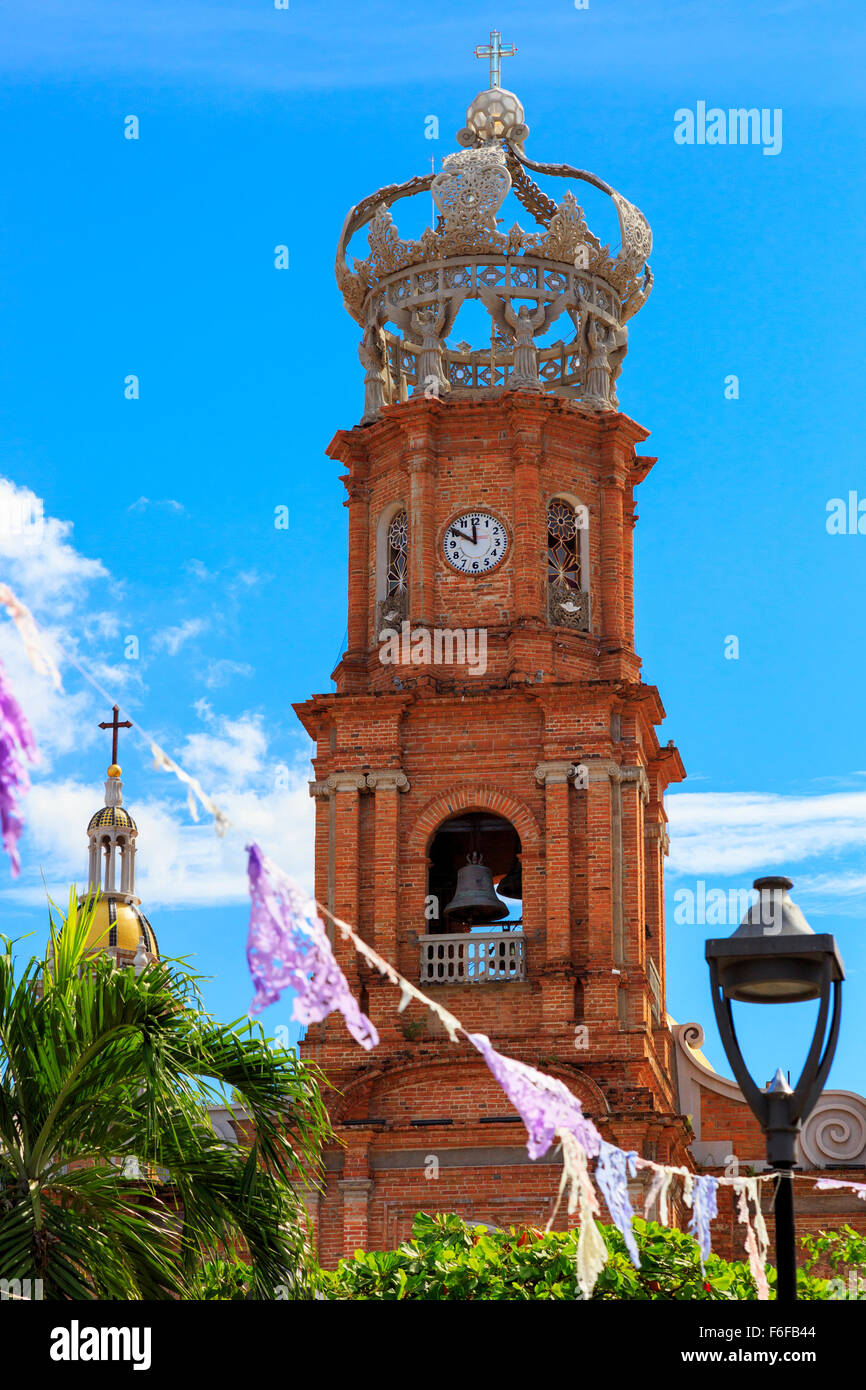 The Church of Our Lady of Guadalupe with its ornate spire and crowned