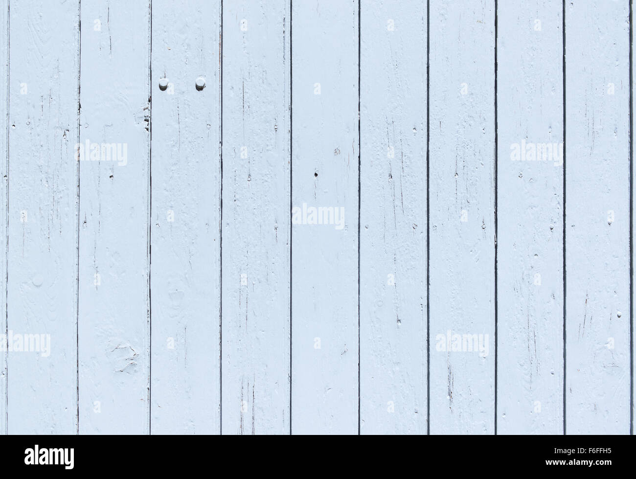 Close up of a traditional old blue painted wooden door in Provence, France, Europe. Pattern, texture, wallpaper, background. Stock Photo