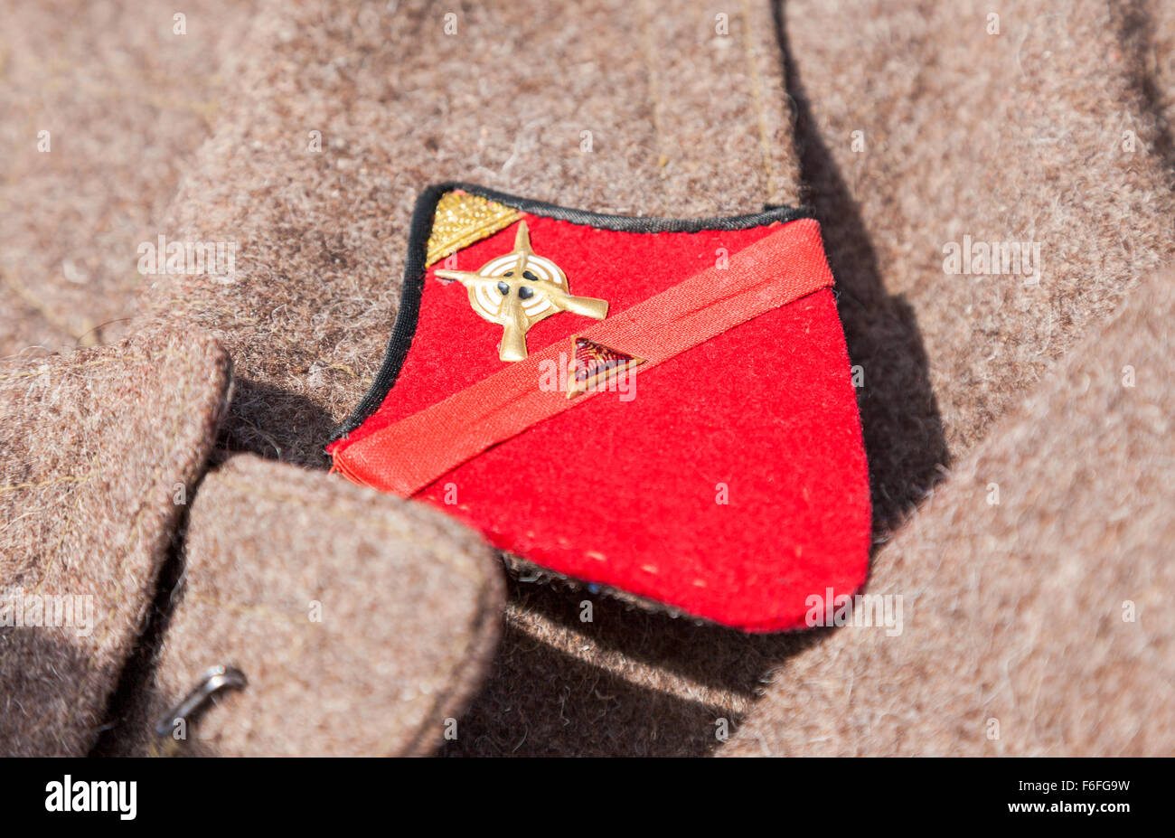 Distinctive sign on an old greatcoat of russian red army Stock Photo