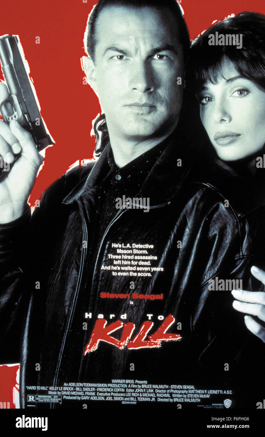 RELEASE DATE: February 9, 1990   MOVIE TITLE: Hard to Kill   STUDIO: Warner Bros. Pictures   DIRECTOR: Bruce Malmuth   PLOT: Mason Storm, a 'go it alone' cop, is gunned down at home. The intruders kill his wife, and think they've killed both Mason and his son too. Mason is secretly taken to a hospital where he spends several years in a coma. His son meanwhile is growing up thinking his father is dead. When Mason wakes up, everyone is in danger - himself, his son, his best friend, his nurse - but most of all those who arranged for his death.   PICTURED: STEVEN SEAGAL as Mason Storm and KELLY LE Stock Photo