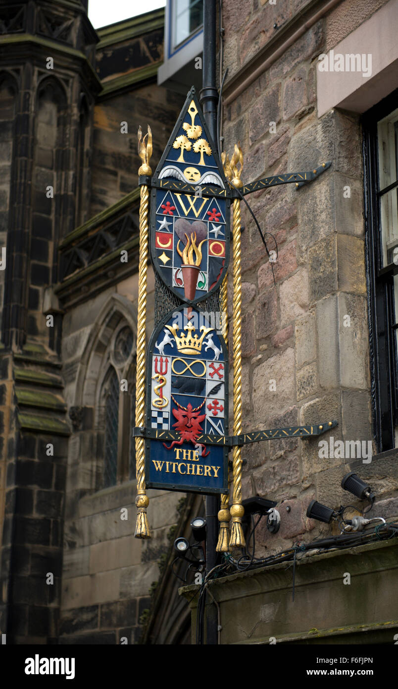 Ornate and colourful signage for the Witchery on Edinburghs Royal Mile Stock Photo