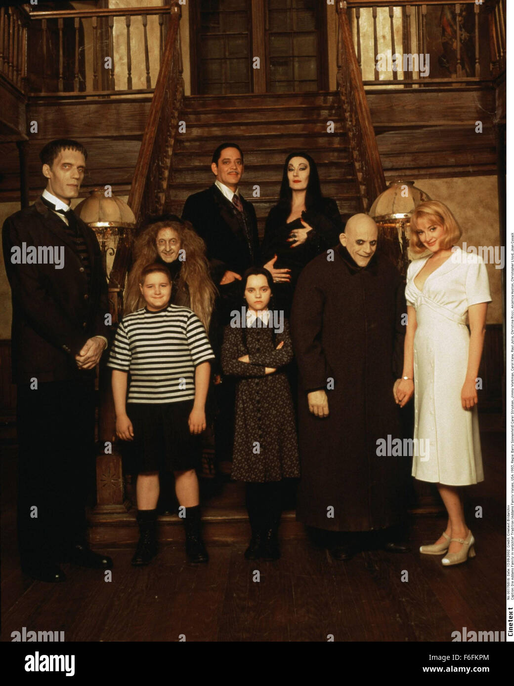 RELEASE DATE: 22 November 1991. MOVIE TITLE: The Addams Family - STUDIO: Paramount Pictures. PLOT: Con artists plan to fleece the eccentric family using an accomplice who claims to be their long lost Uncle Fester. PICTURED: CAREL STRUYCKEN as Lurch with JIMMY WORKMAN as Pugsley Addams, JUDITH MALINA as Grandma, RAUL JULIA as Gomez Addams, CHRISTINA RICCI as Wednesday Addams, ANJELICA HUSTON as Morticia Addams, CHRISTOPHER LLOYD as Uncle Fester and JOAN CUSACK as Debbie Jellinsky. Stock Photo