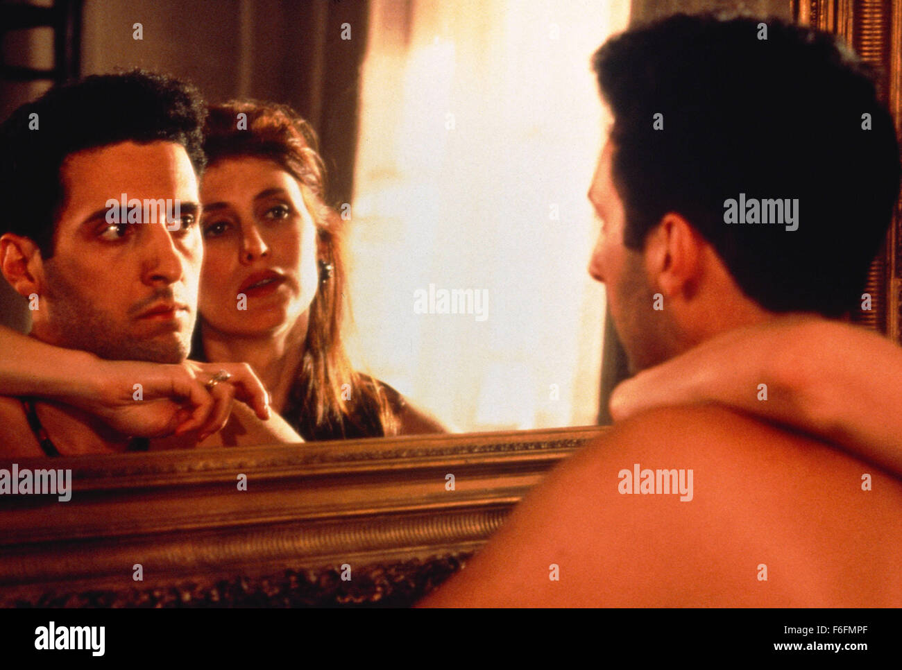 RELEASE DATE: 18 January 1991. MOVIE TITLE: Men of Respect - STUDIO: Grandview Avenue Pictures. PLOT: A hitman heeds a spiritualist's prophesies that he will rise to the head of his family. PICTURED: JOHN TURTURRO as Mike Battaglia and KATHERINE BOROWITZ as Ruthie Battaglia. Stock Photo