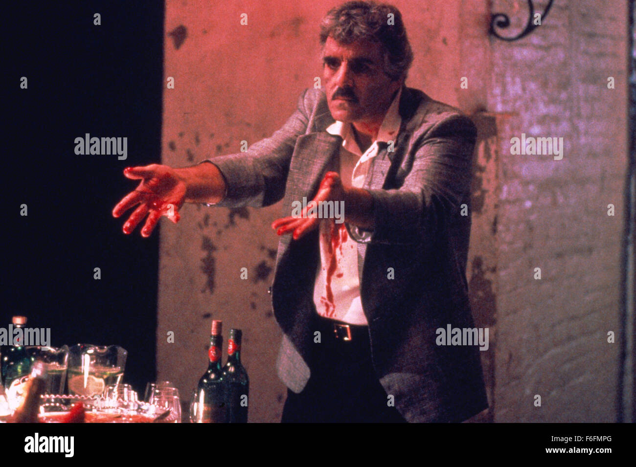 RELEASE DATE: 18 January 1991. MOVIE TITLE: Men of Respect - STUDIO: Grandview Avenue Pictures. PLOT: A hitman heeds a spiritualist's prophesies that he will rise to the head of his family. PICTURED: DENNIS FARINA as Bankie Como. Stock Photo
