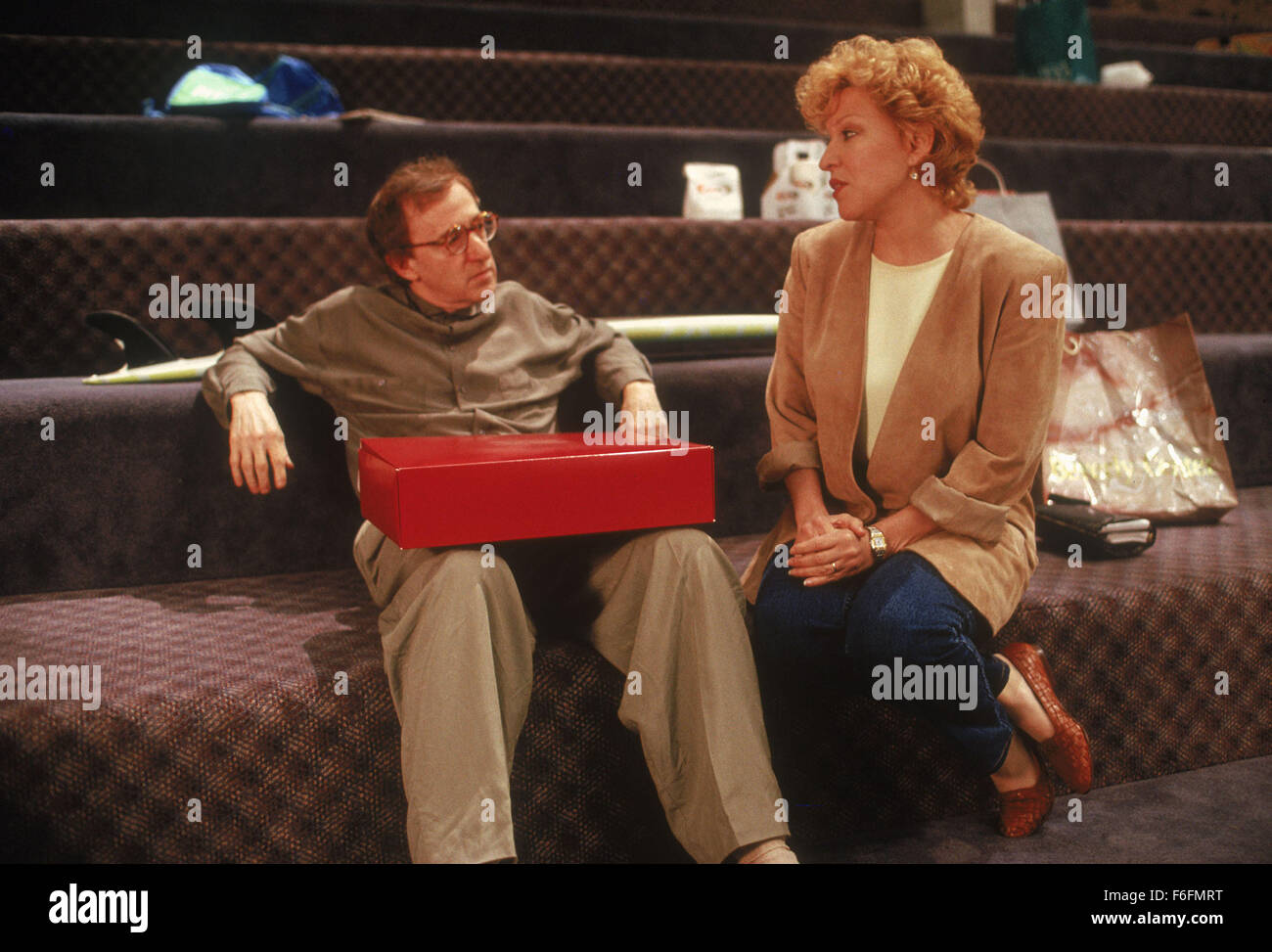 RELEASE DATE: February 22, 1991. MOVIE TITLE: Scenes From A Mall. STUDIO: Touchstone Pictures. PLOT: On their 16th anniversary a married couple's trip to a Beverly Hills mall becomes the stage for personal revelations and deceptions.. PICTURED: WOODY ALLEN as Nick Fifer, BETTE MIDLER as Deborah Fifer. Stock Photo