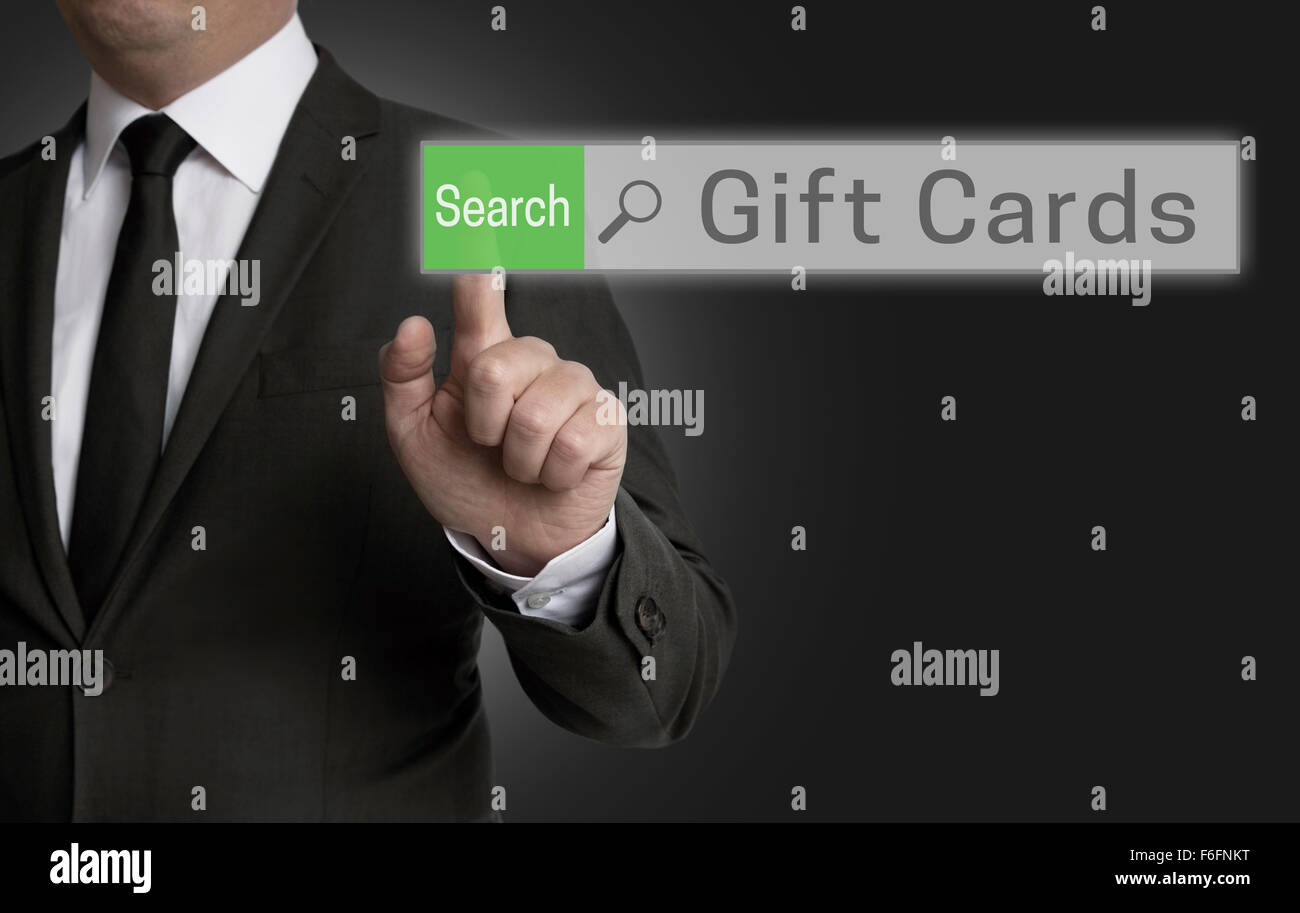 Gifts Cards browser is operated by businessman concept. Stock Photo